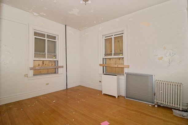 26 MacArthur Loop Highland Park, IL 60035 - Photo 25 of 47 a view of an empty room with wooden floor and a window
