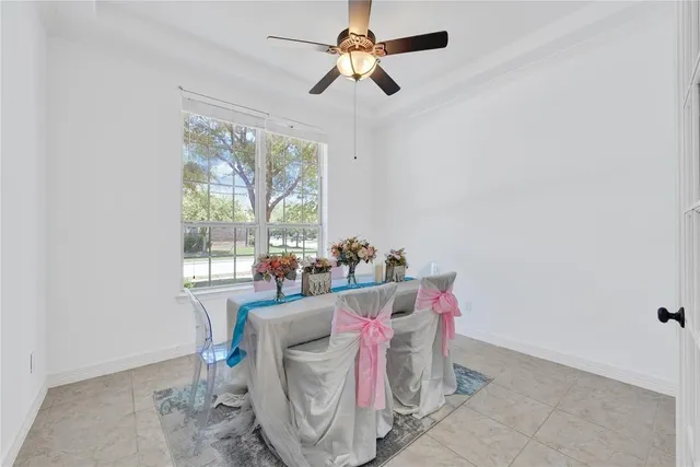 a bathroom with a granite countertop sink a toilet and bathtub