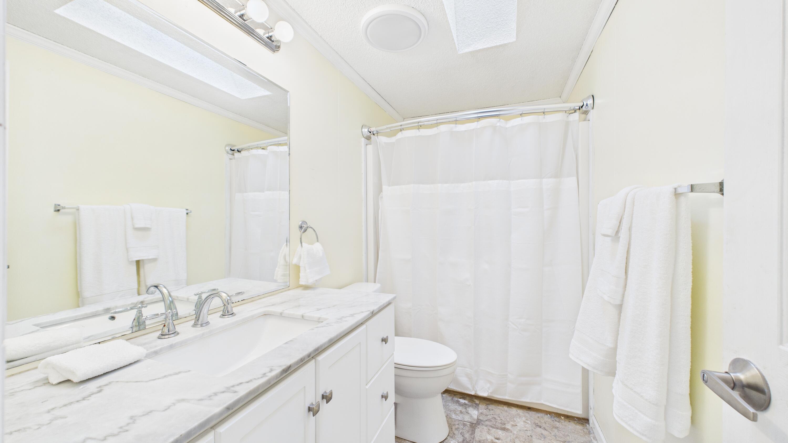 409 Chippendale Lane Bonneau, SC 29431 - Photo 15 of 21 Main House Bathroom
