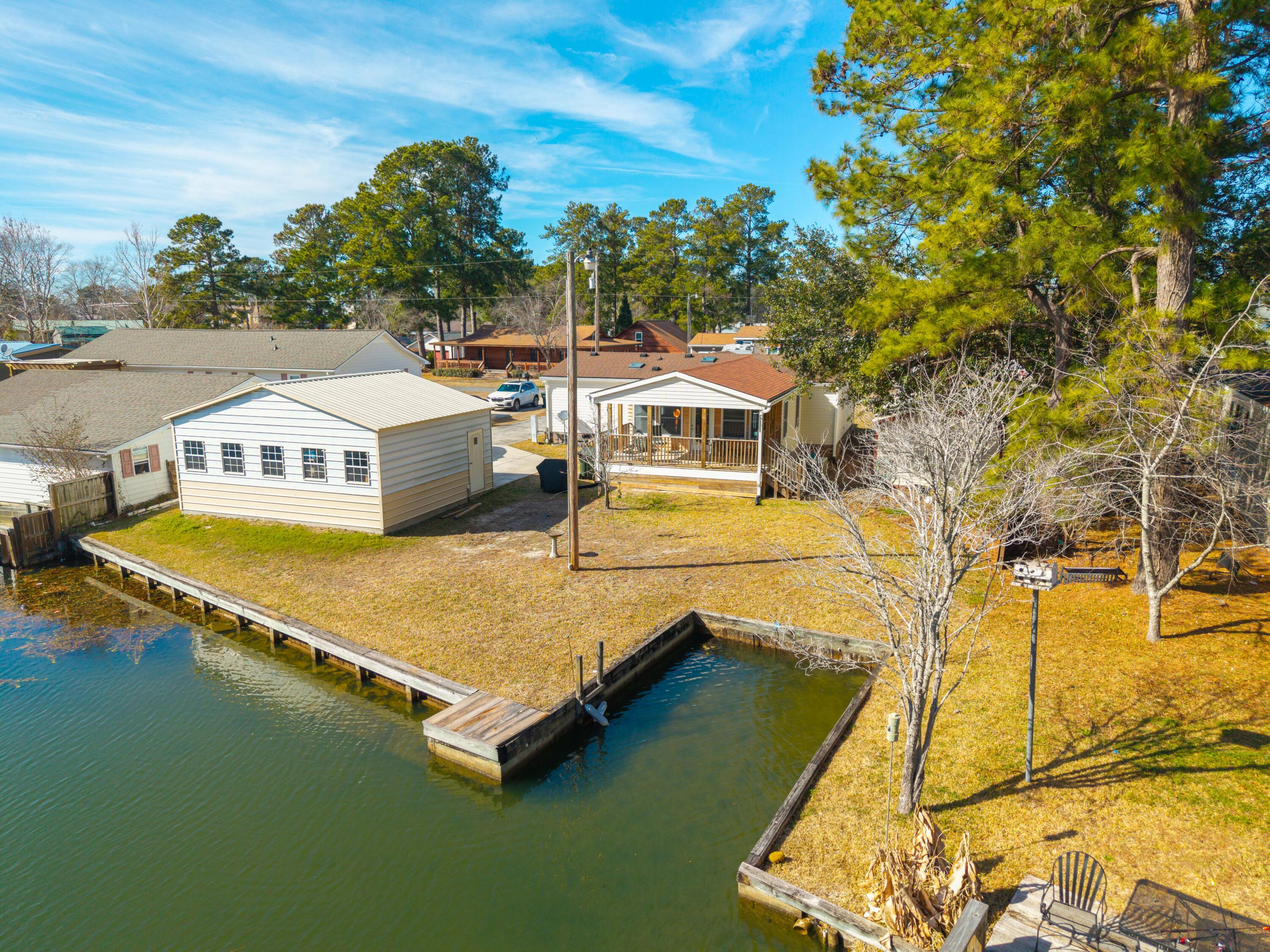 409 Chippendale Lane Bonneau, SC 29431 - Photo 2 of 21 DJI_20260212143832_0060_D