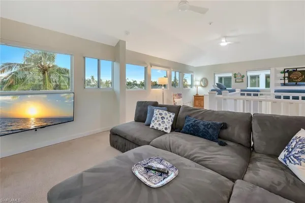 a view of a living room and a wooden floor