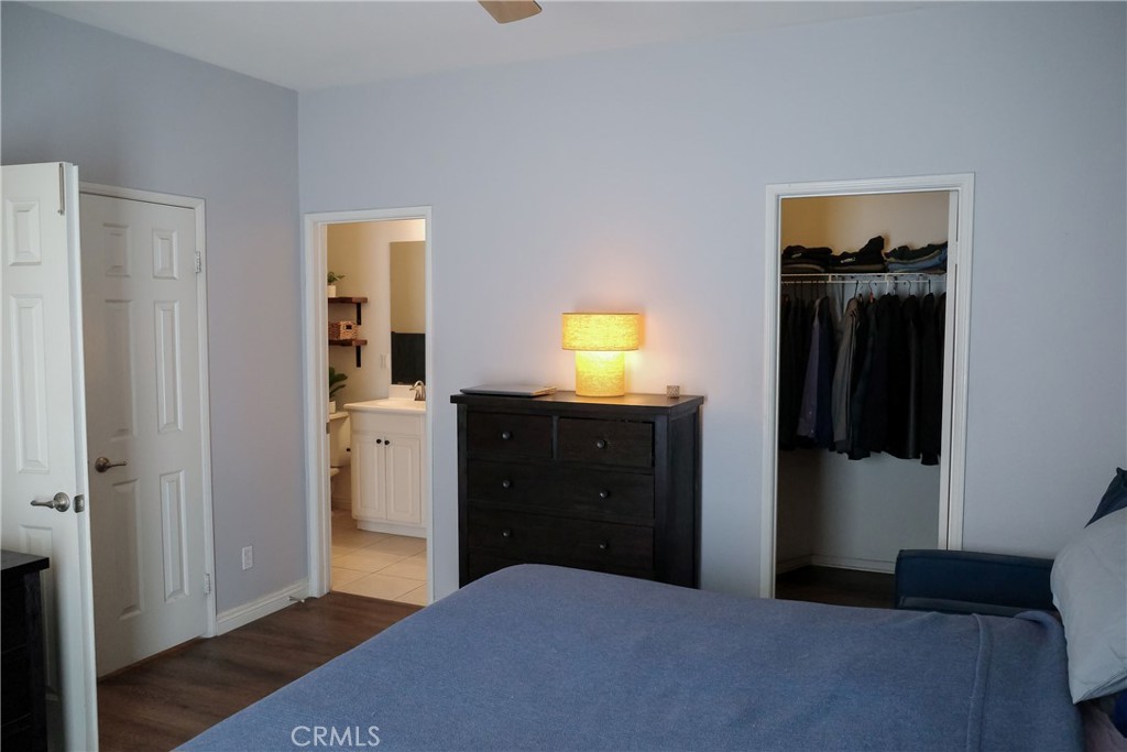 7331 Shelby Place Rancho Cucamonga, CA 91739 - Photo 12 of 17 a bedroom with a bed and a mirror on dresser