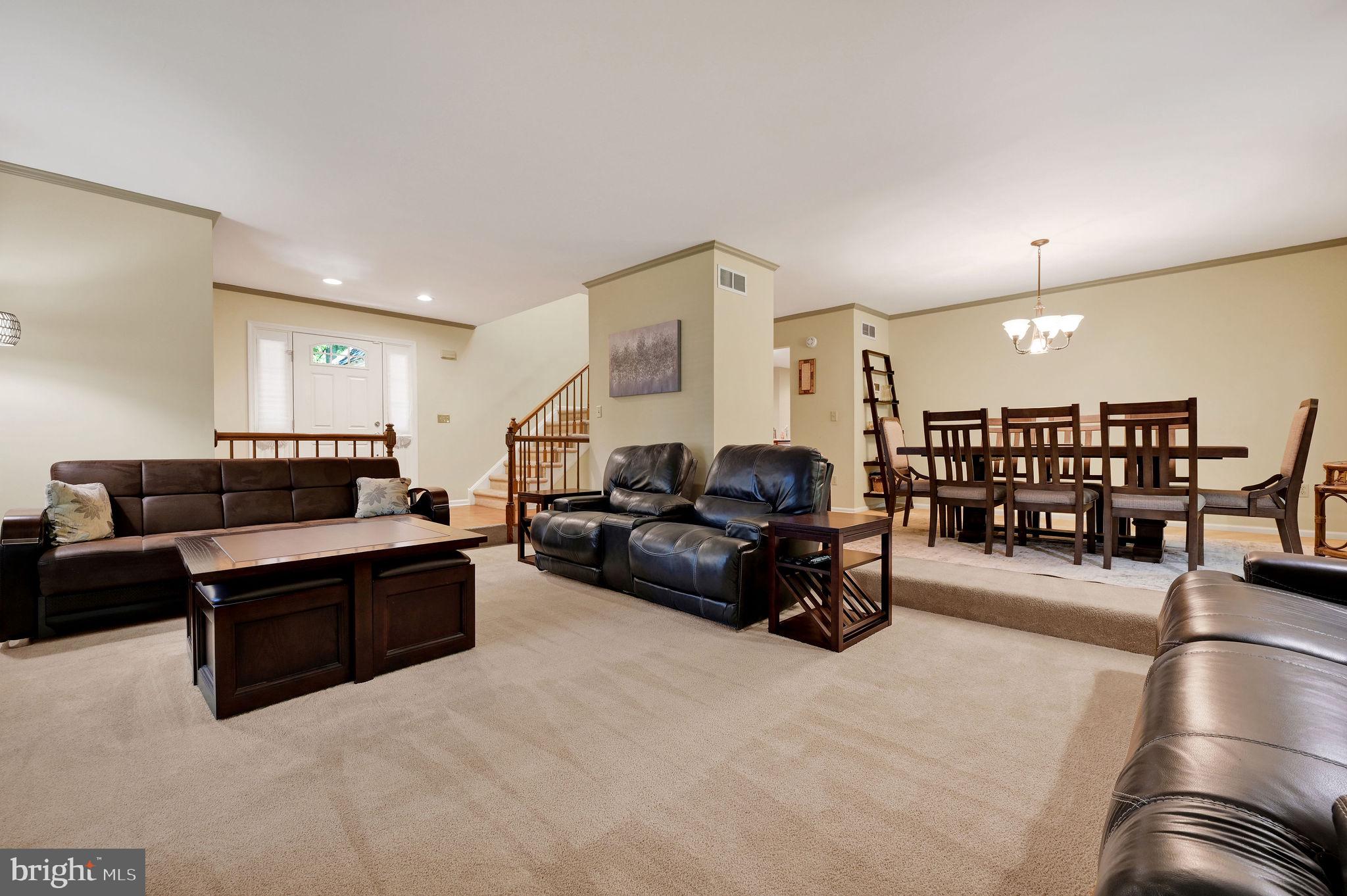 176 Burning Tree Road Dover, DE 19904 - Photo 13 of 33 Spacious living area with warm tones.