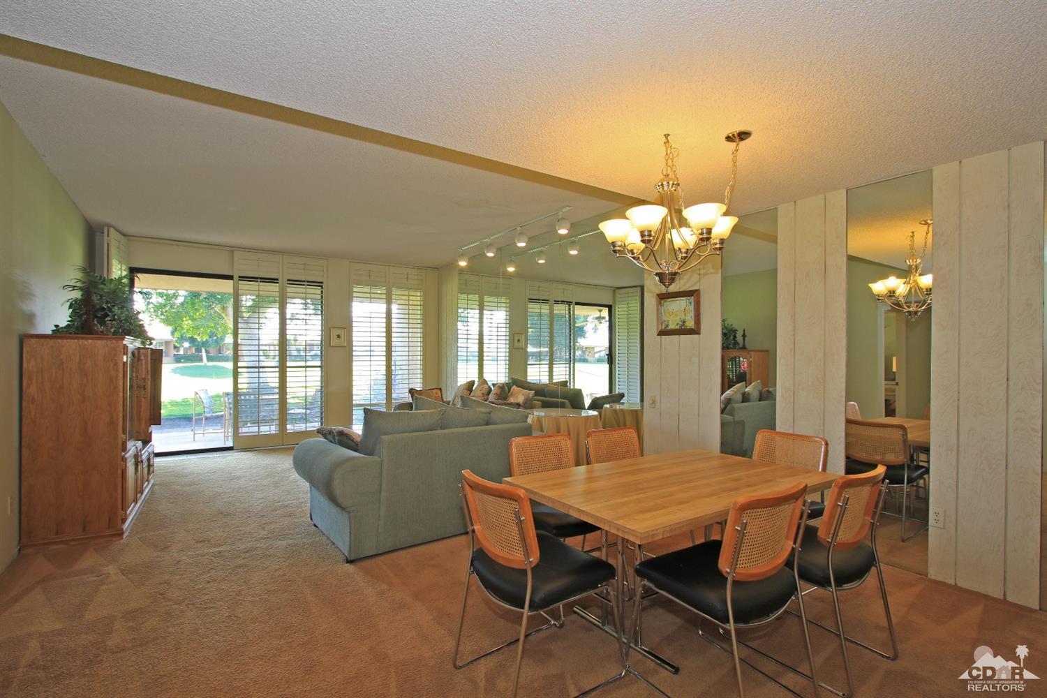 7 Palma Drive Rancho Mirage, CA 92270 - Photo 17 of 33 a dining room with furniture and window
