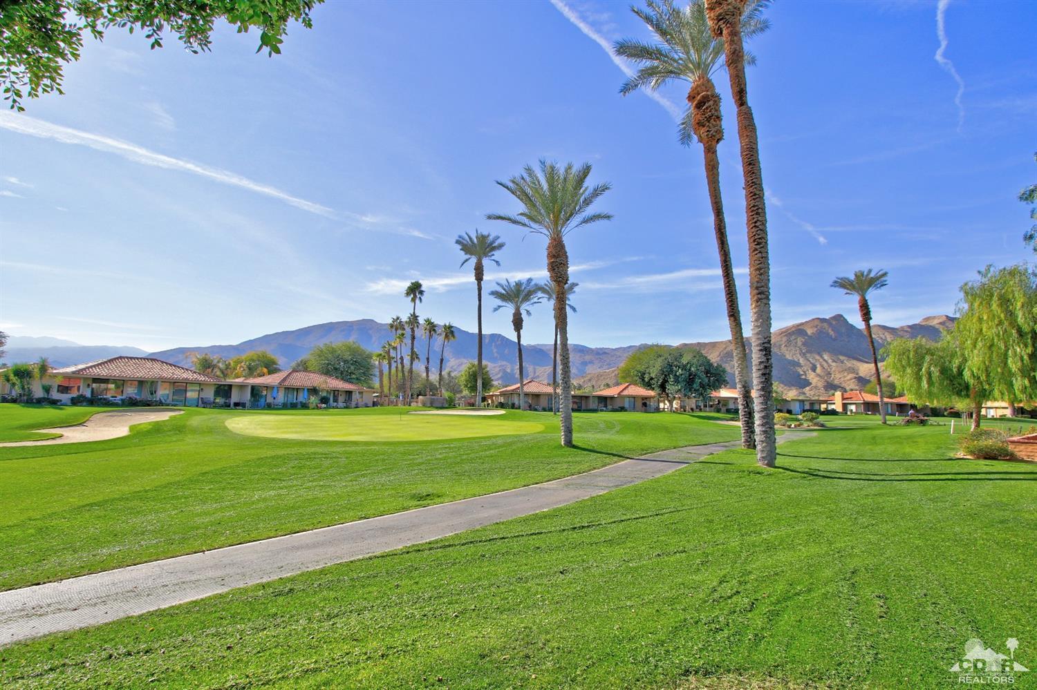 7 Palma Drive Rancho Mirage, CA 92270 - Photo 29 of 33 a view of a park with large trees