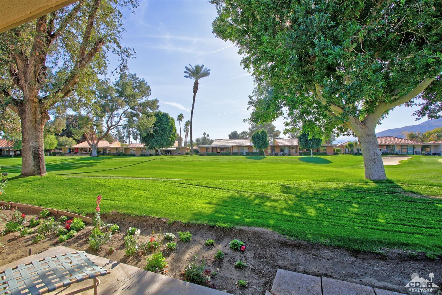 7 Palma Drive Rancho Mirage, CA 92270 - Photo 4 of 33 a view of a park with large trees