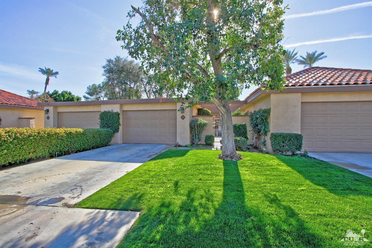 7 Palma Drive Rancho Mirage, CA 92270 - Photo 5 of 33 a front view of a house with garden