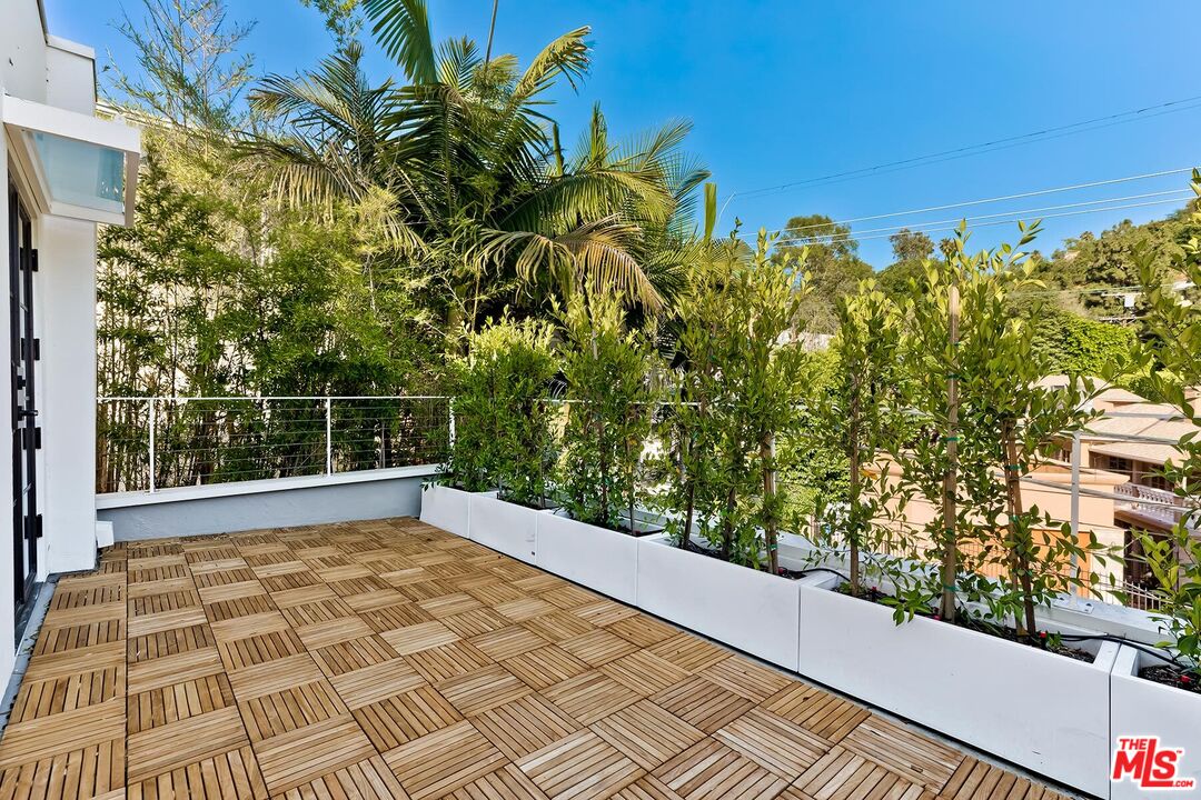 2203 Bowmont Drive Beverly Hills, CA 90210 - Photo 11 of 21 a view of a garden