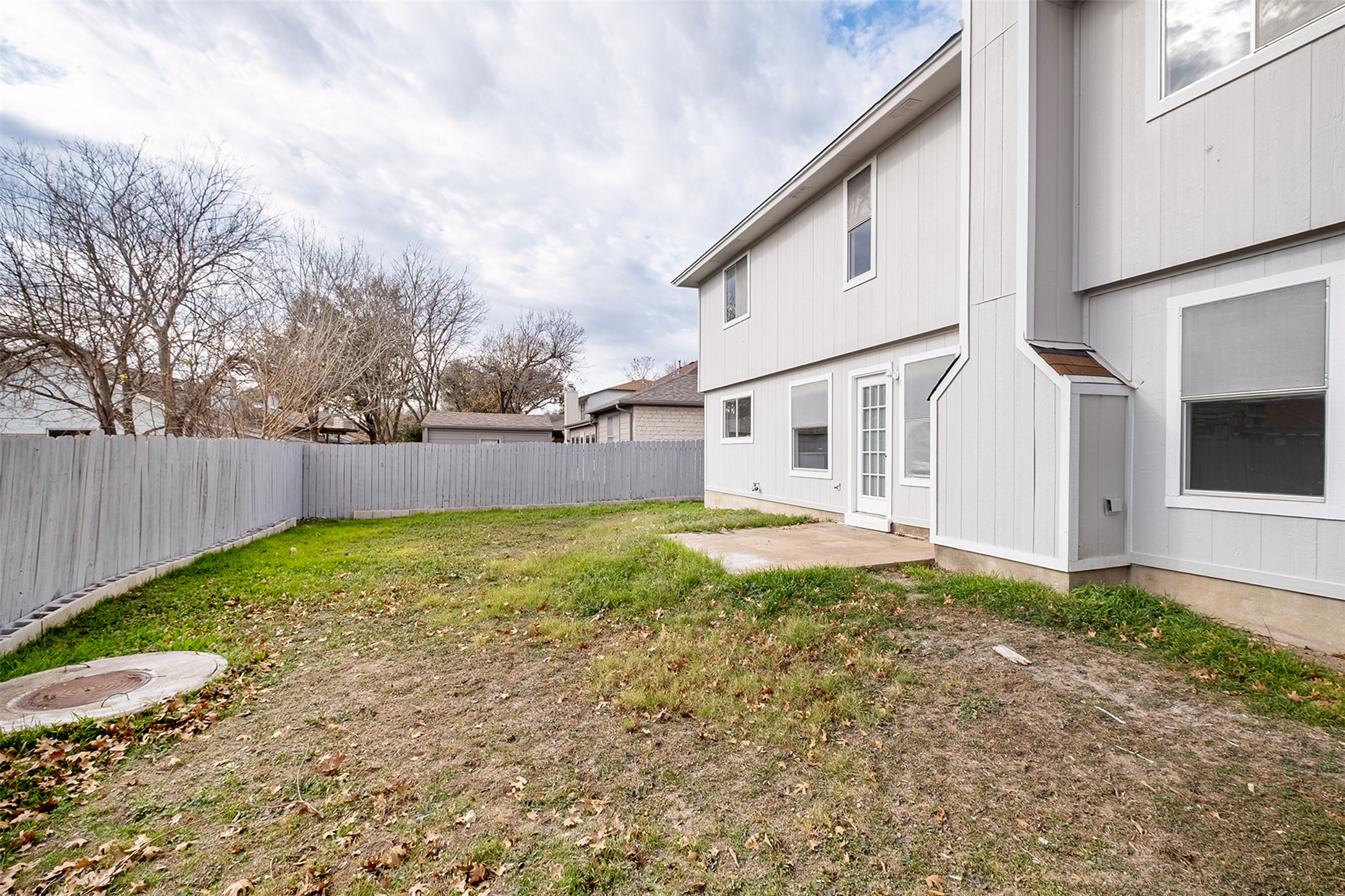 518 Tanner Trail Pflugerville, TX 78660 - Photo 31 of 32 a view of a house with backyard and sitting area