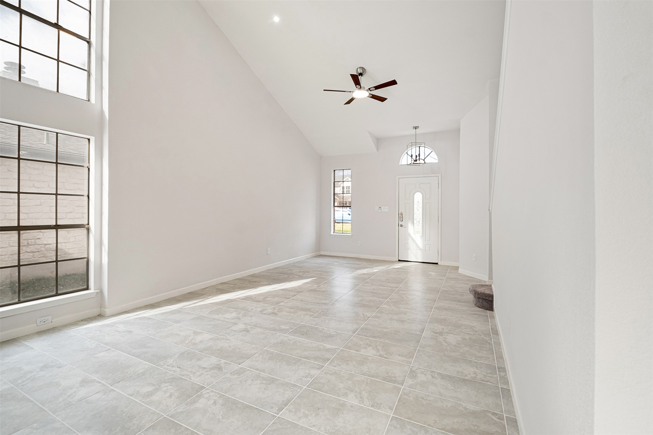518 Tanner Trail Pflugerville, TX 78660 - Photo 6 of 32 a view of an empty room with a window