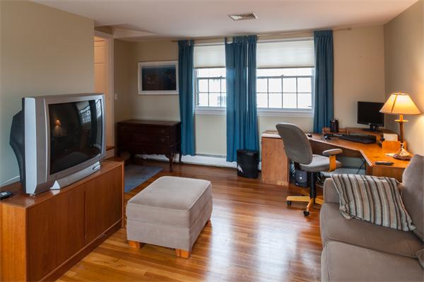 4 Buchanan Road Marblehead, MA 01945 - Photo 7 of 11 a living room with furniture and a flat screen tv