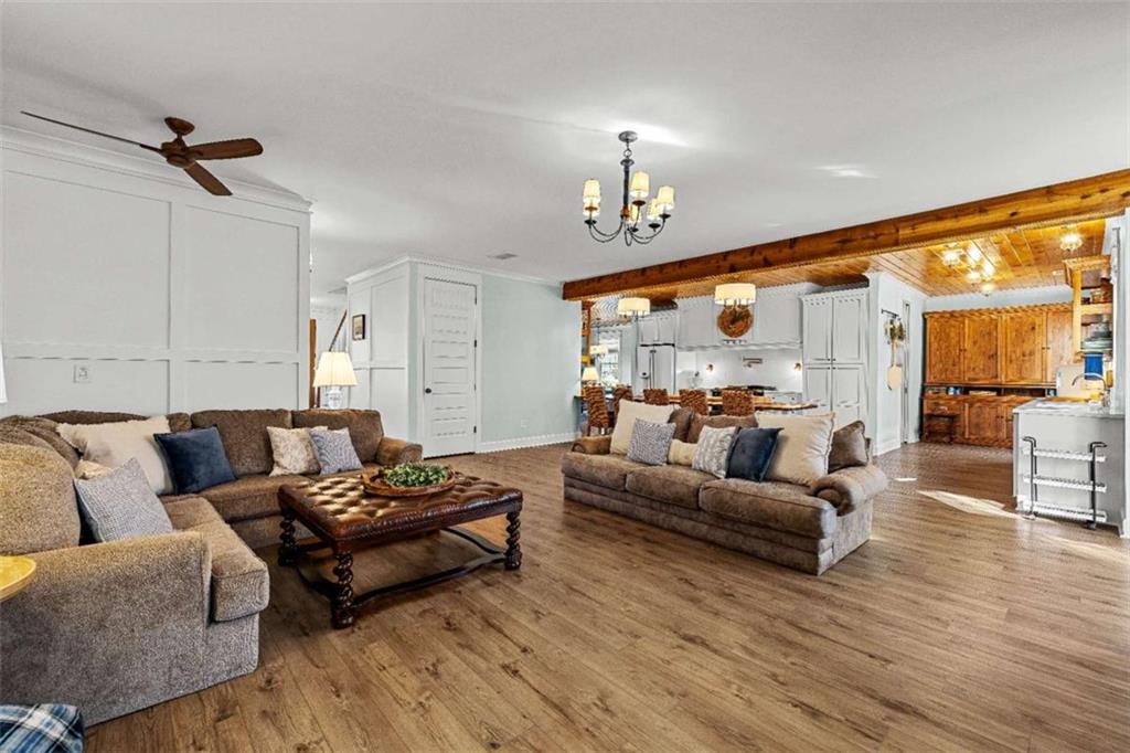 619 Old Greenville Road Fayetteville, GA 30215 - Photo 26 of 107 a living room with furniture and wooden floor