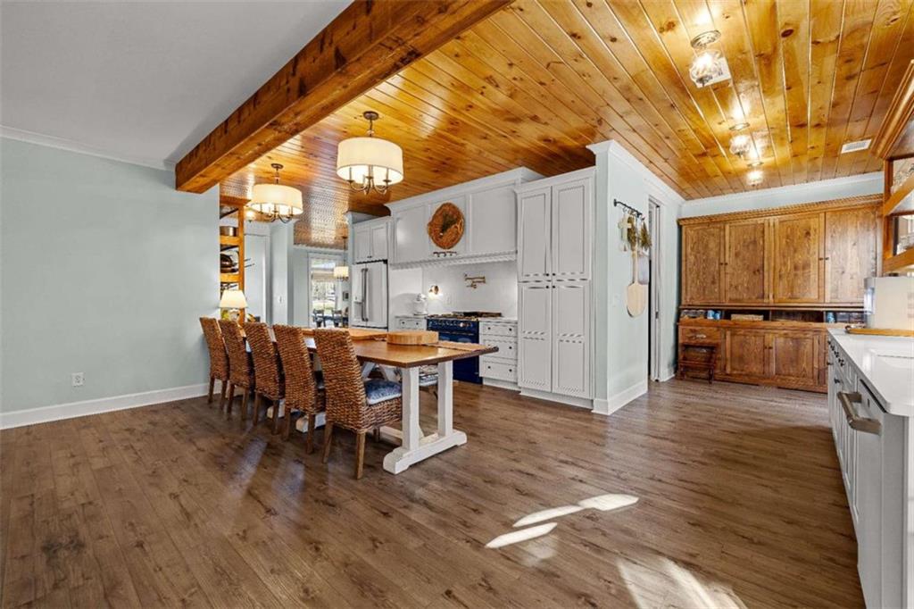 619 Old Greenville Road Fayetteville, GA 30215 - Photo 29 of 107 a view of a dining room with furniture and a table