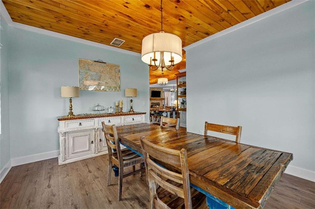 619 Old Greenville Road Fayetteville, GA 30215 - Photo 35 of 107 a kitchen with a table and chairs in it