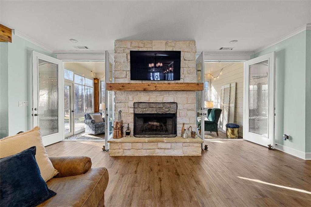 619 Old Greenville Road Fayetteville, GA 30215 - Photo 4 of 107 a living room with furniture and a fireplace