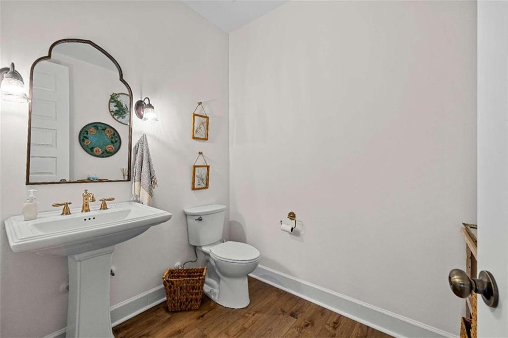 619 Old Greenville Road Fayetteville, GA 30215 - Photo 47 of 107 a bathroom with a sink and a mirror