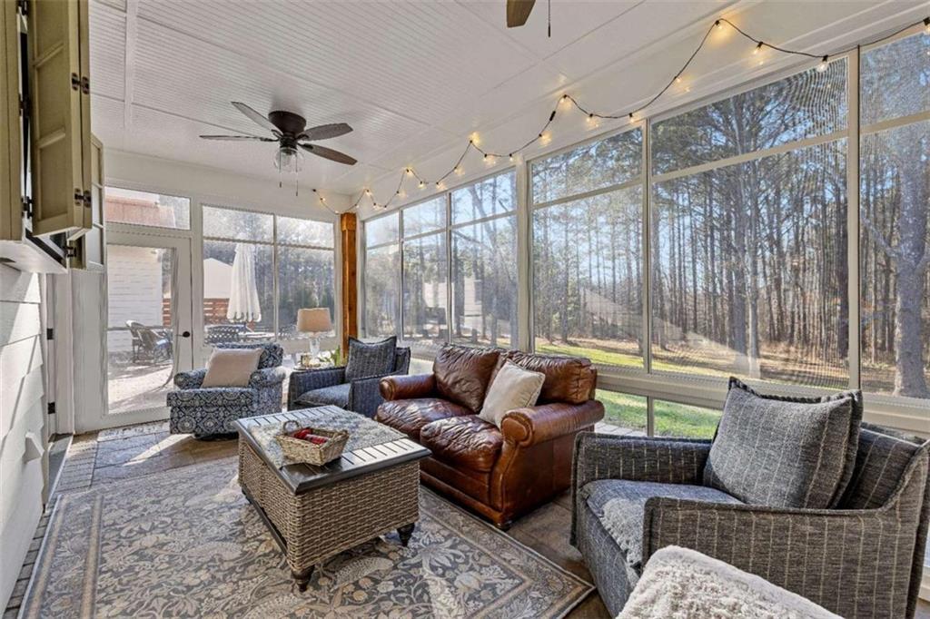 619 Old Greenville Road Fayetteville, GA 30215 - Photo 5 of 107 a living room with furniture and a large window