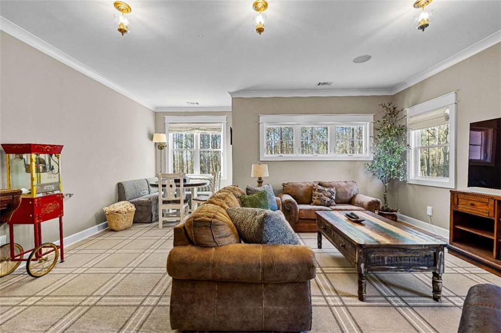 619 Old Greenville Road Fayetteville, GA 30215 - Photo 70 of 107 a living room with furniture and a window