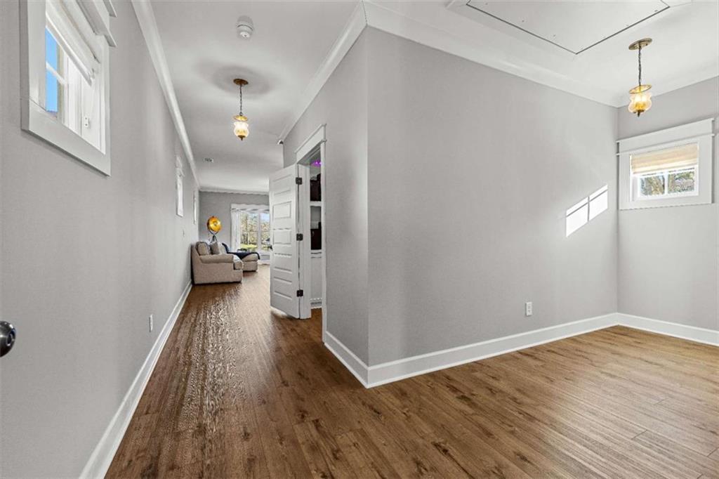 619 Old Greenville Road Fayetteville, GA 30215 - Photo 86 of 107 a view of a hallway view with wooden floor and furniture
