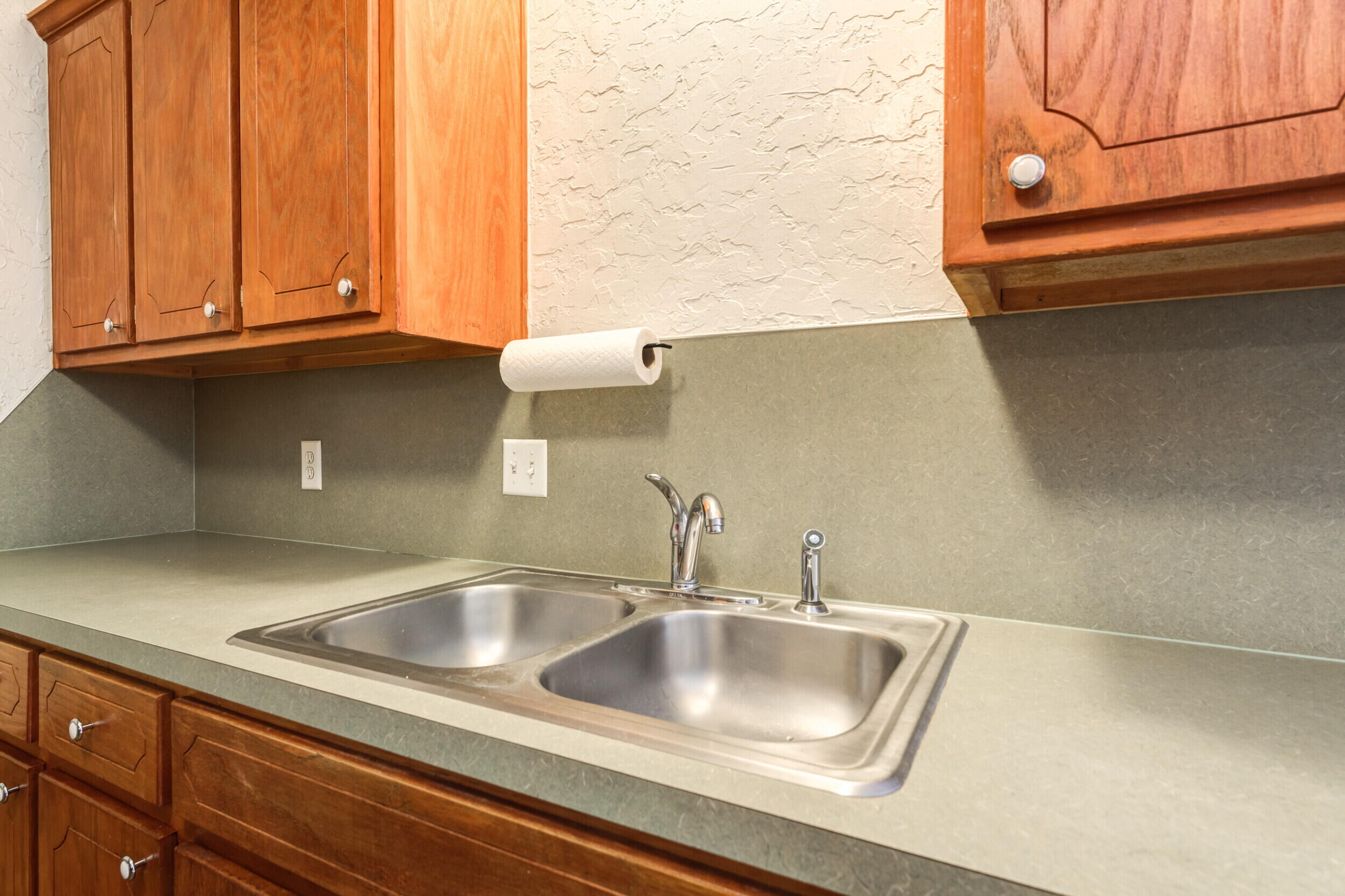 6325 14th Street Lubbock, TX 79416 - Photo 14 of 28 a close view of sink and tap