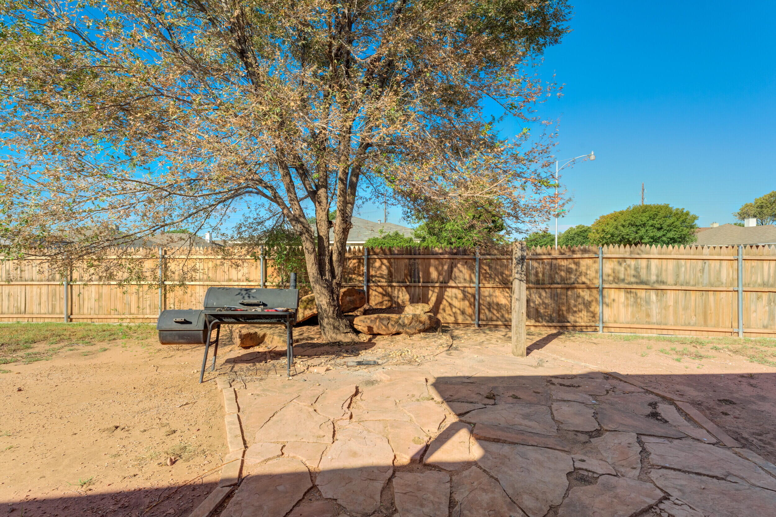 6325 14th Street Lubbock, TX 79416 - Photo 25 of 28 a view of outdoor space with seating area