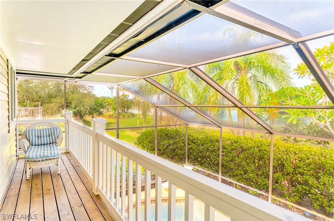 1031 Sand Castle Road Sanibel, FL 33957 - Photo 13 of 27 a view of a balcony with chairs