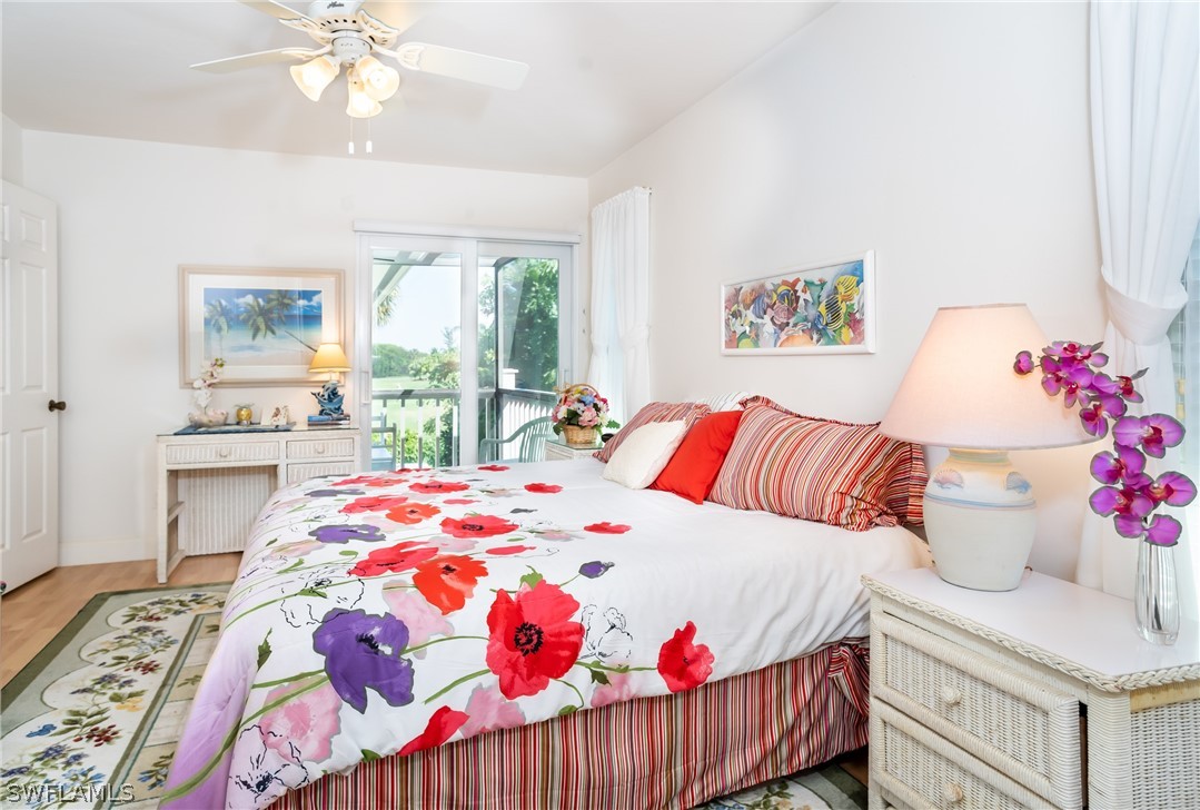 1031 Sand Castle Road Sanibel, FL 33957 - Photo 14 of 27 a bedroom with a bed and a dresser in it