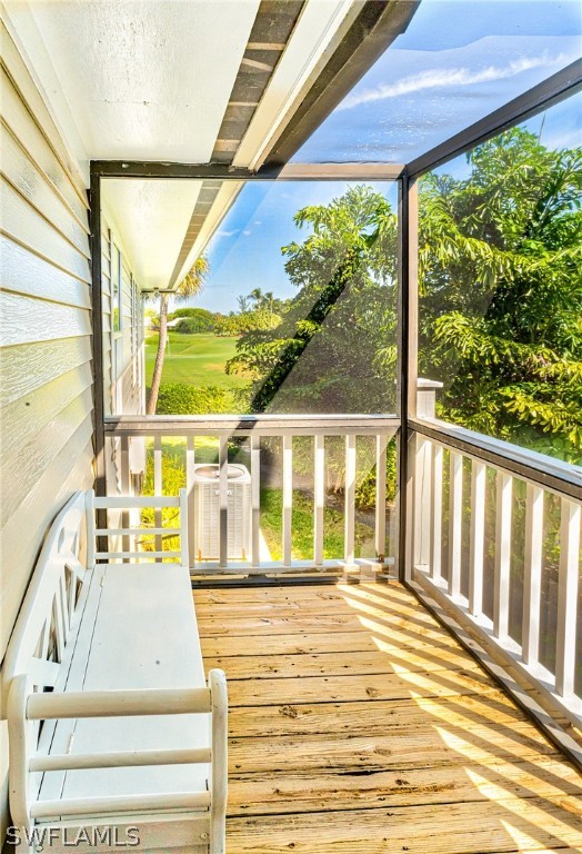 1031 Sand Castle Road Sanibel, FL 33957 - Photo 15 of 27 a view of a balcony with wooden floor