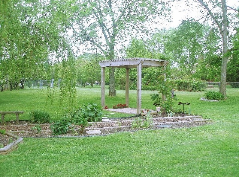 2306 Riverstone Drive Murfreesboro, TN 37128 - Photo 18 of 18 a garden view with a seating space