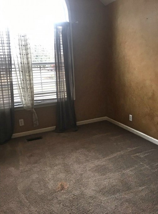 2306 Riverstone Drive Murfreesboro, TN 37128 - Photo 9 of 18 a view of an empty room with a window