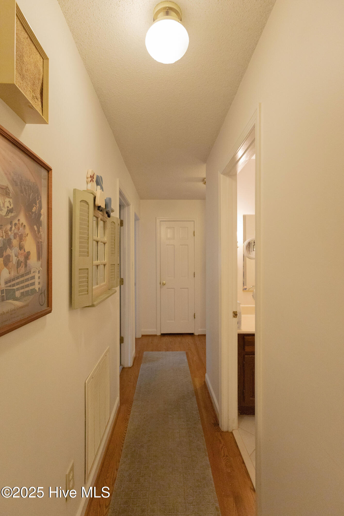 2404 Riddick Road Elizabeth City, NC 27909 - Photo 35 of 55 Hall 1 - Wood Floors