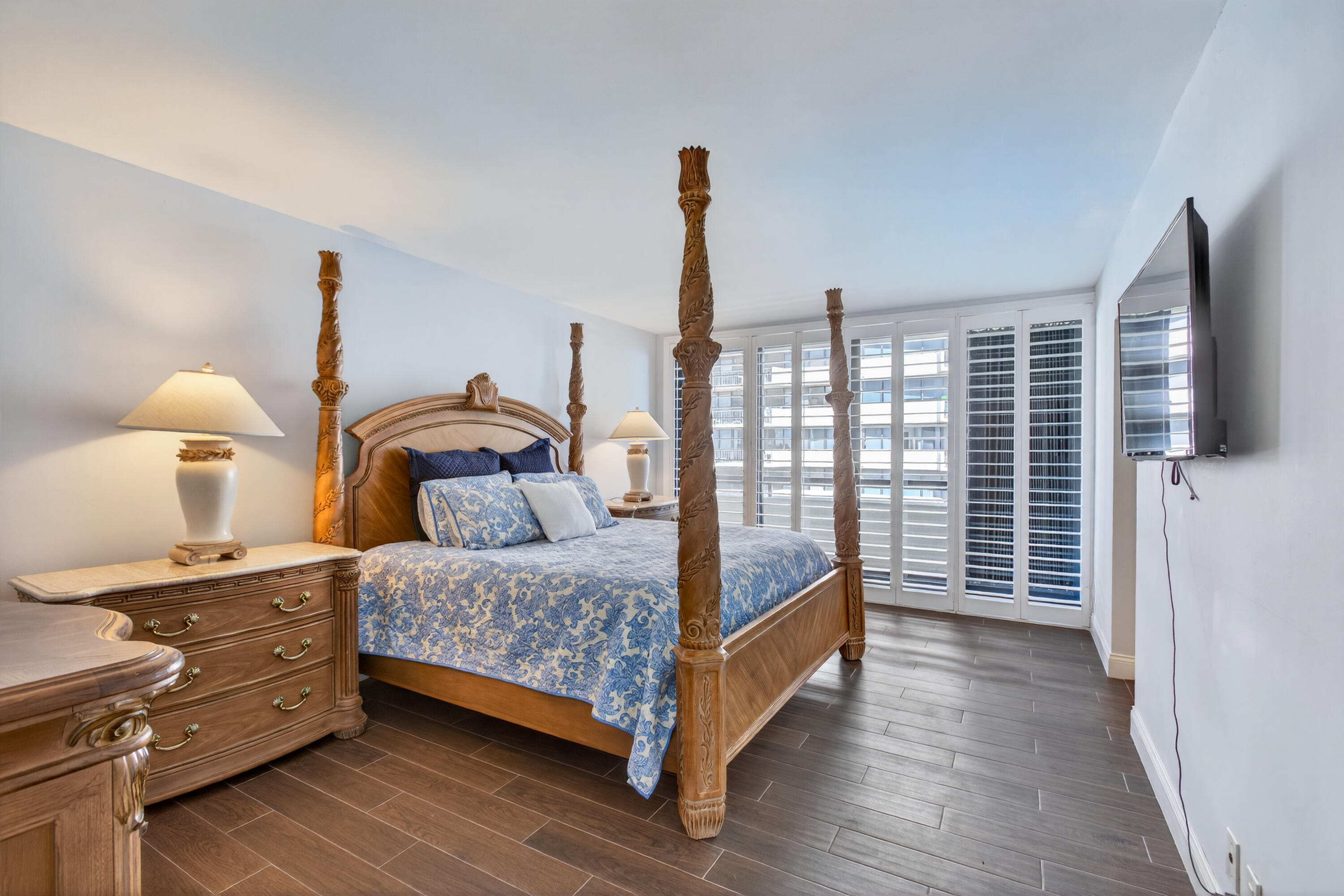 4050 North Ocean Drive, Unit 301 Riviera Beach, FL 33404 - Photo 36 of 62 a bedroom with a bed and a window