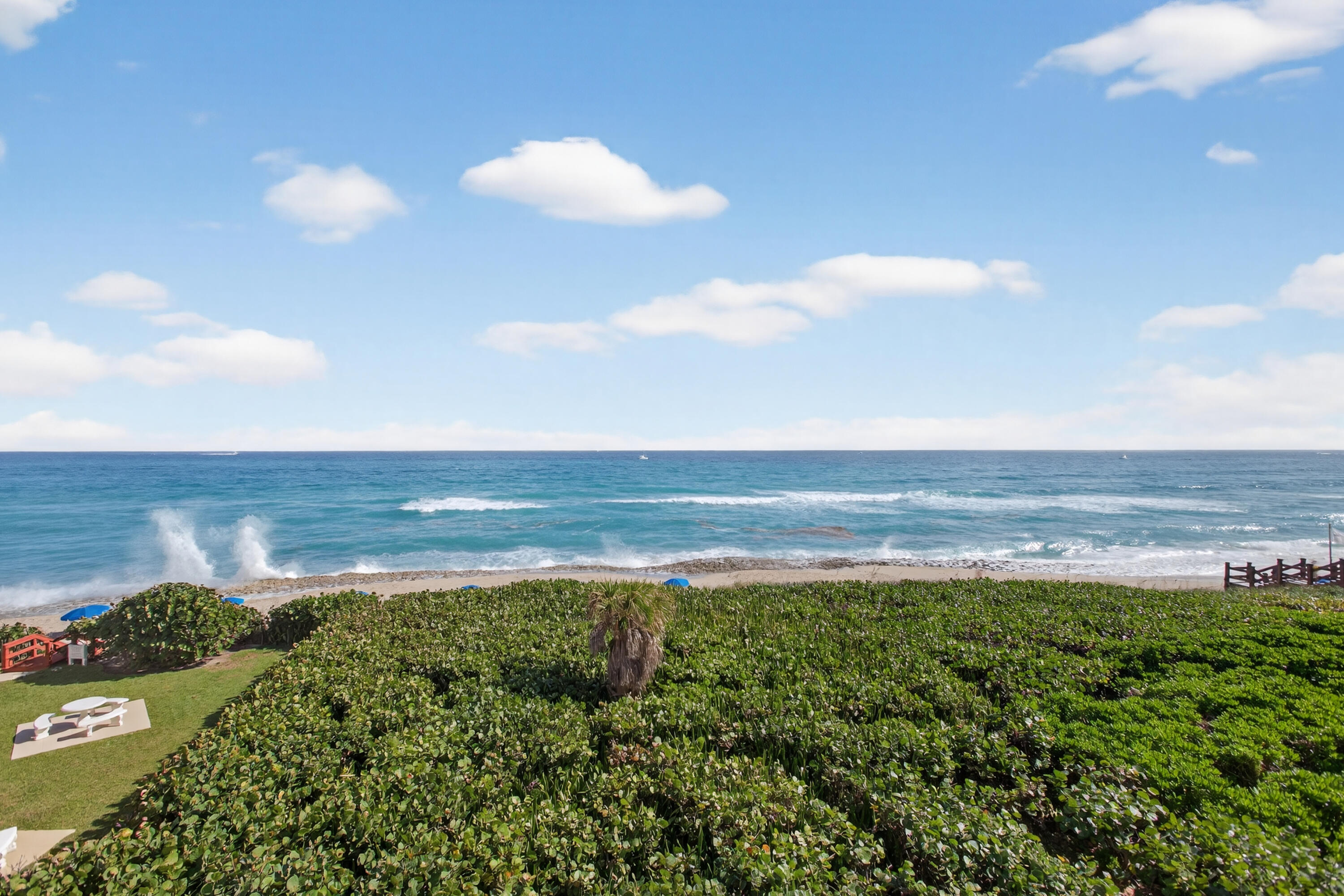 4050 North Ocean Drive, Unit 301 Riviera Beach, FL 33404 - Photo 46 of 62 a view of a lake from a yard