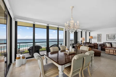 a view of a livingroom with furniture and a chandelier