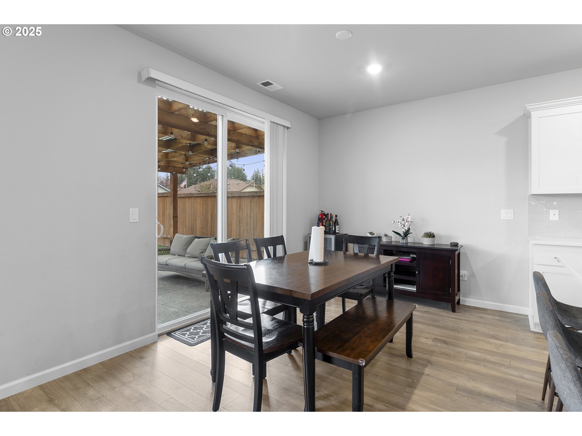 3072 Southeast 25th Street Gresham, OR 97080 - Photo 21 of 48 a view of a dining room with furniture and wooden floor