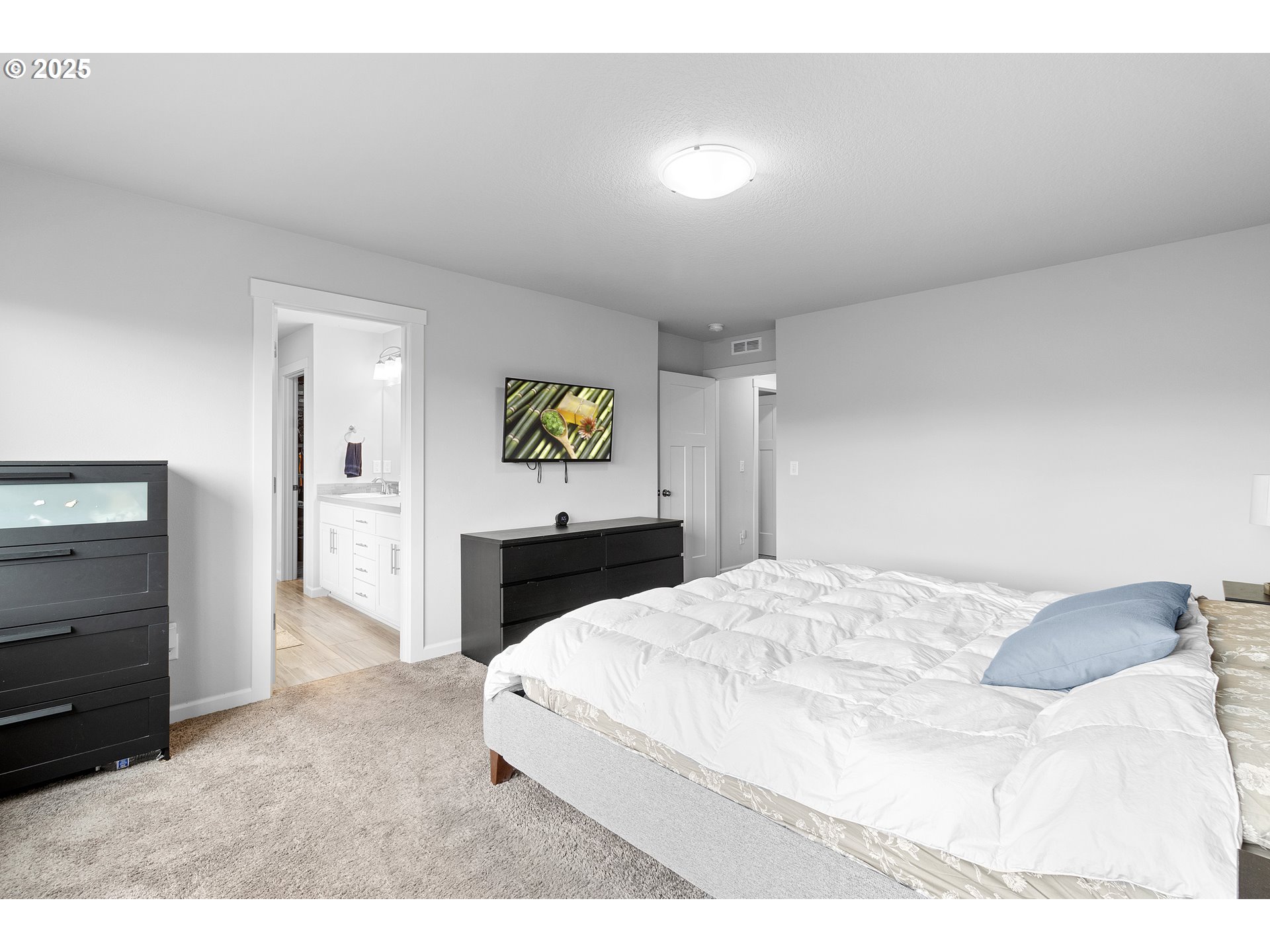 3072 Southeast 25th Street Gresham, OR 97080 - Photo 28 of 48 a view of a bedroom with a bed and cabinet