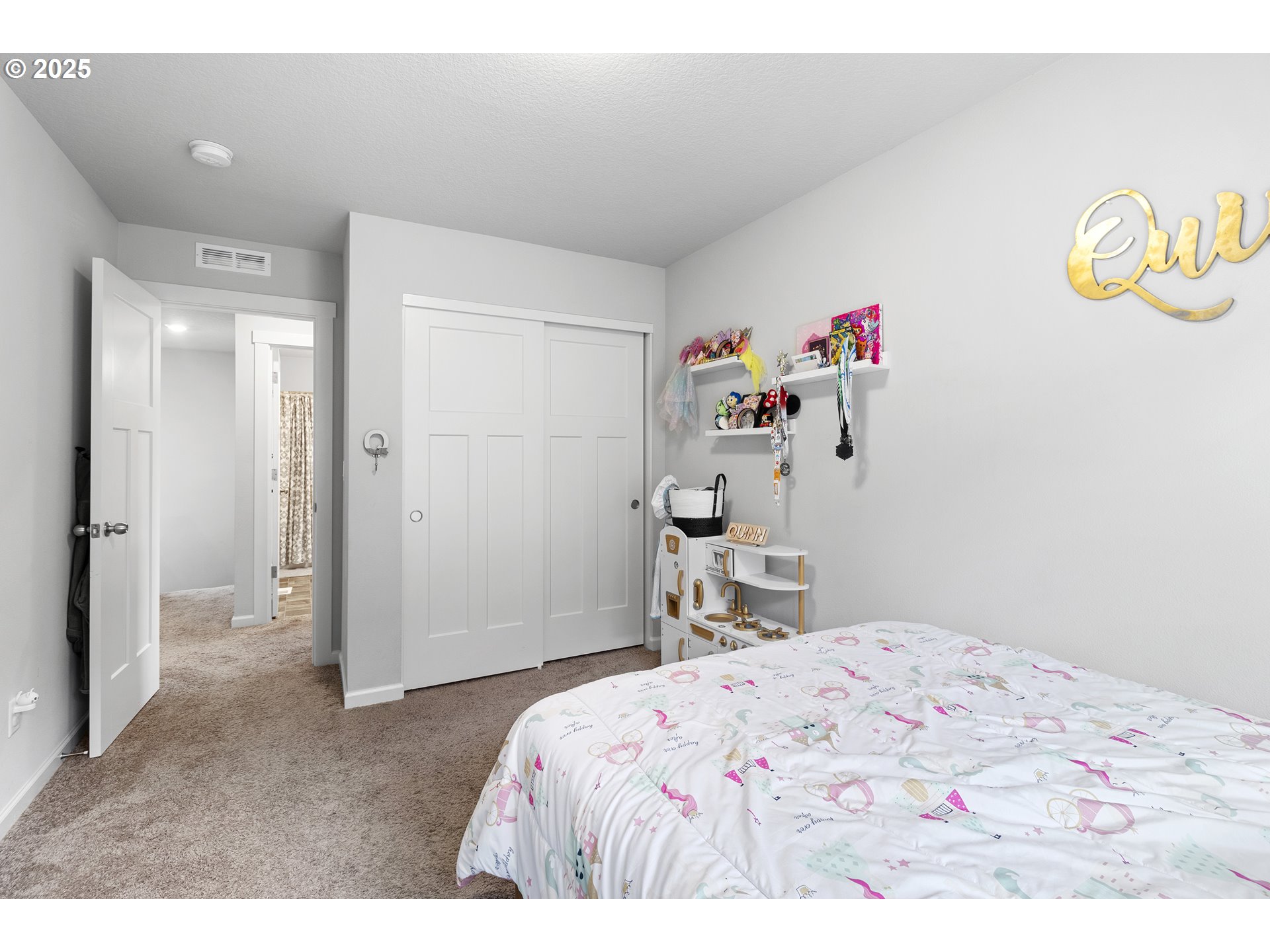 3072 Southeast 25th Street Gresham, OR 97080 - Photo 38 of 48 a bedroom with a bed and a dresser