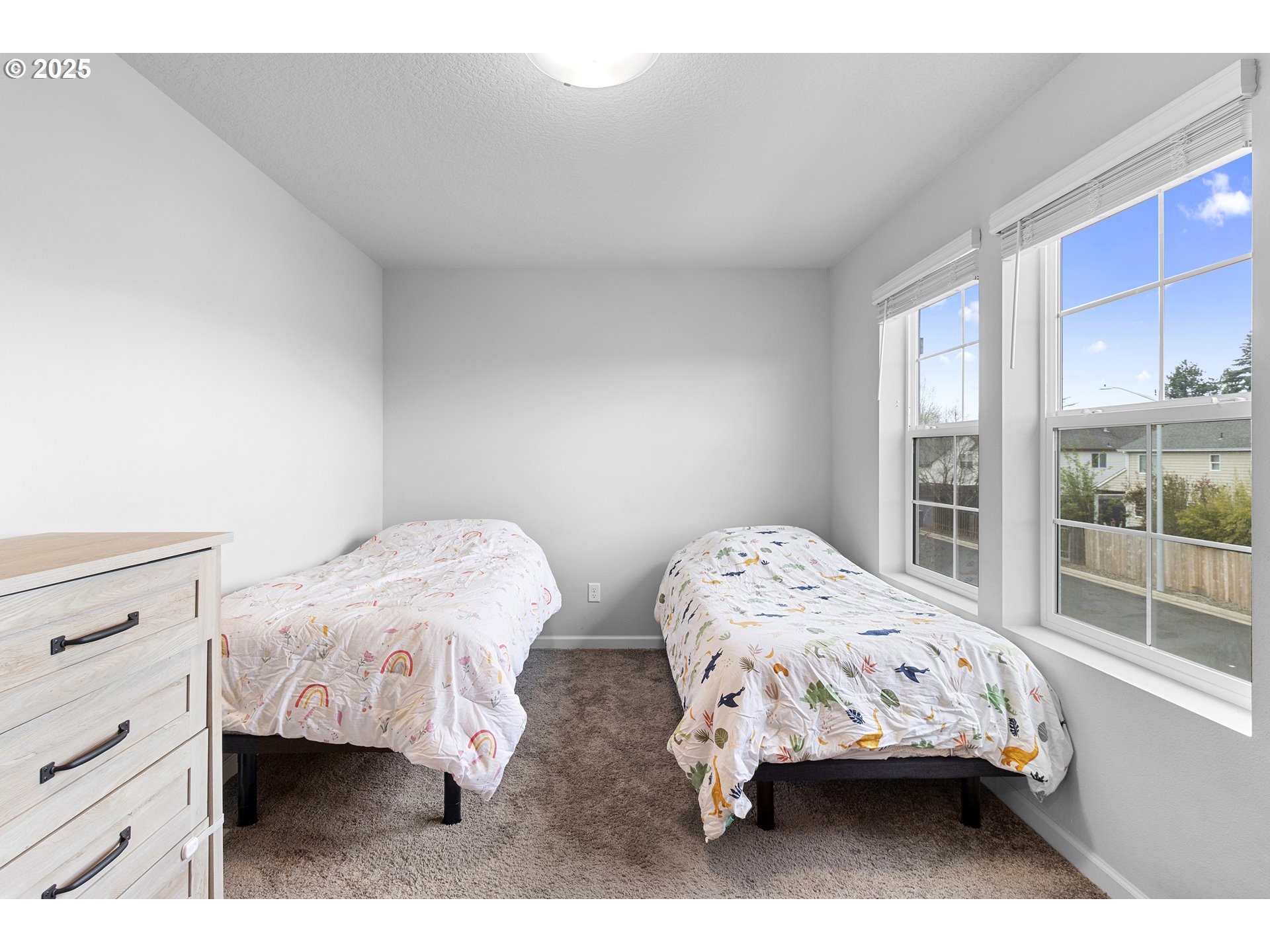 3072 Southeast 25th Street Gresham, OR 97080 - Photo 40 of 48 a bedroom with a bed and a window