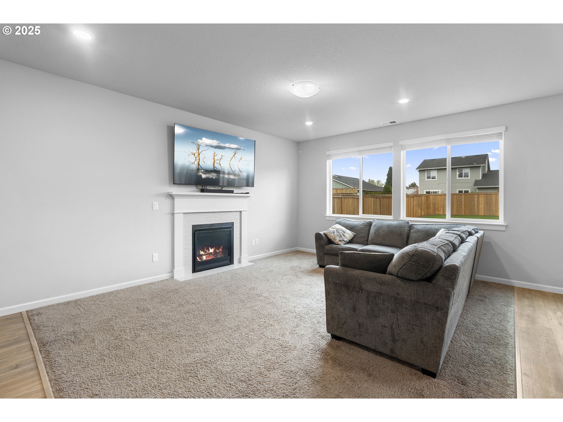 3072 Southeast 25th Street Gresham, OR 97080 - Photo 4 of 48 a living room with furniture and a fireplace