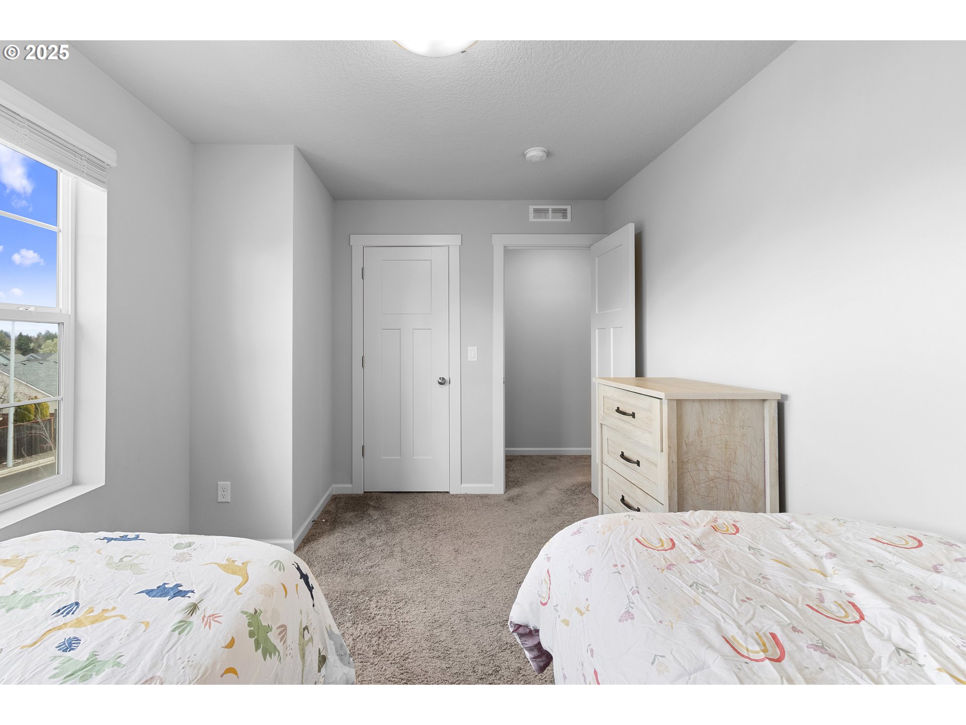 3072 Southeast 25th Street Gresham, OR 97080 - Photo 41 of 48 a bedroom with a bed and a window