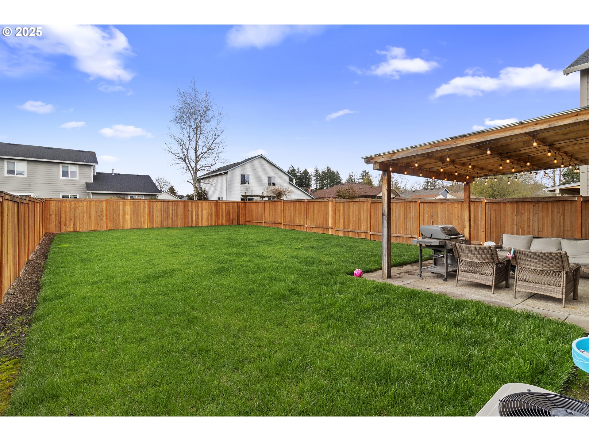 3072 Southeast 25th Street Gresham, OR 97080 - Photo 47 of 48 a view of a house with backyard sitting area and garden