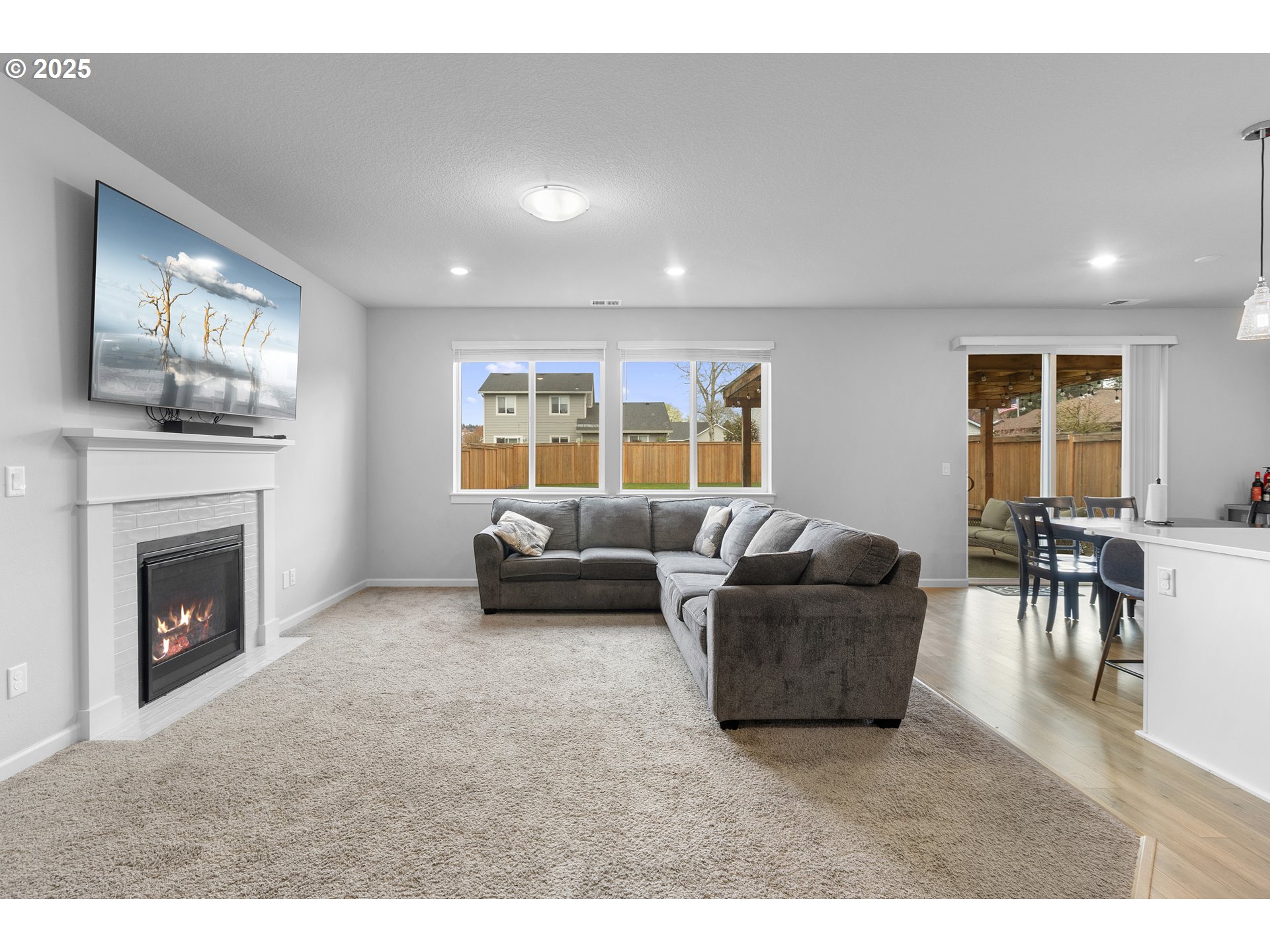 3072 Southeast 25th Street Gresham, OR 97080 - Photo 5 of 48 a living room with furniture and a fireplace