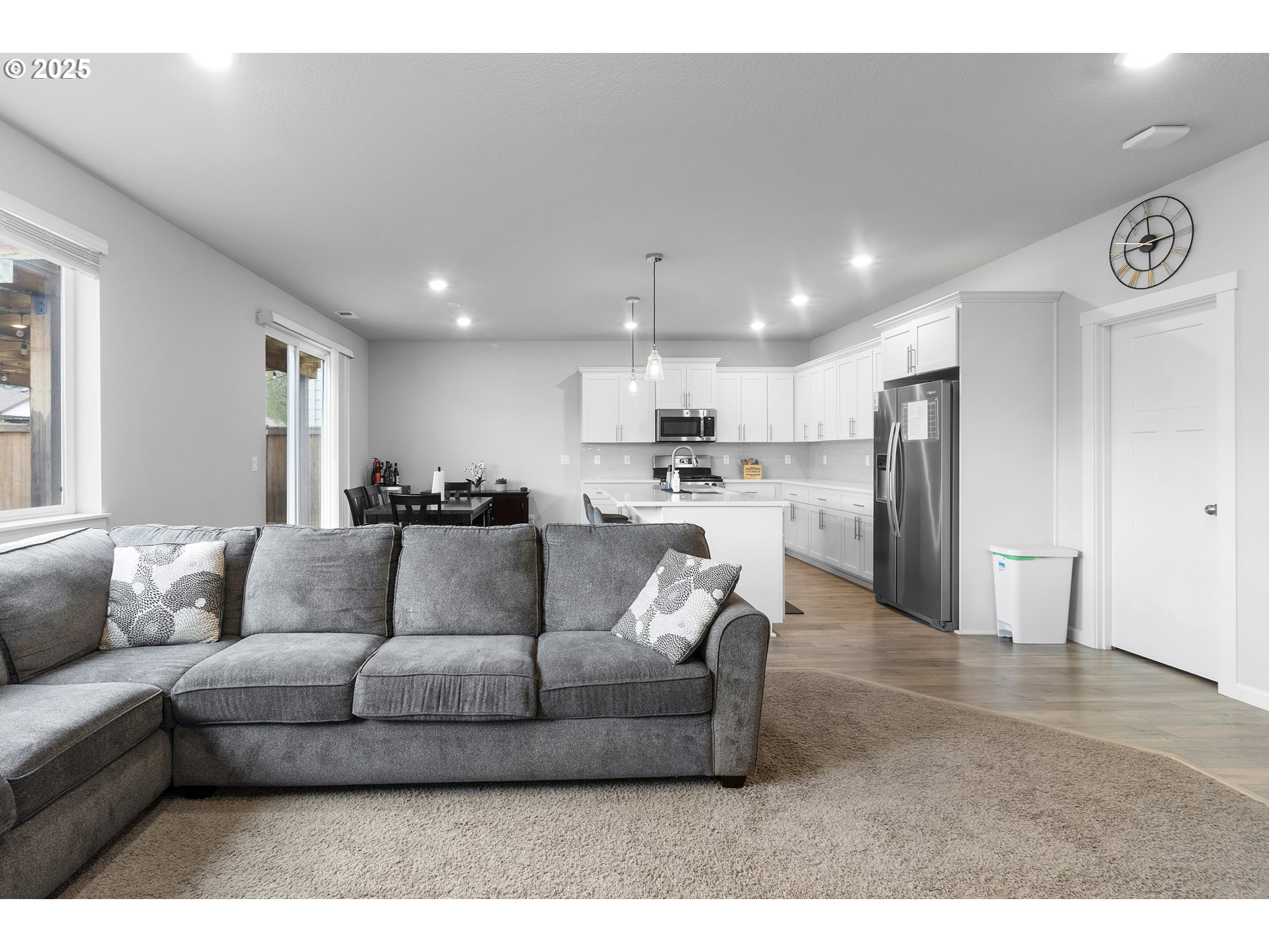 3072 Southeast 25th Street Gresham, OR 97080 - Photo 7 of 48 a living room with furniture and kitchen view