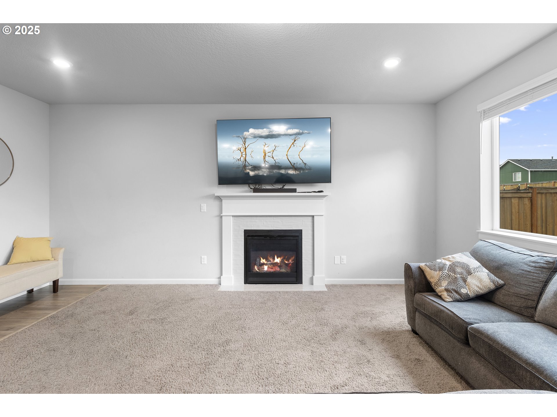 3072 Southeast 25th Street Gresham, OR 97080 - Photo 9 of 48 a living room with furniture and a fireplace