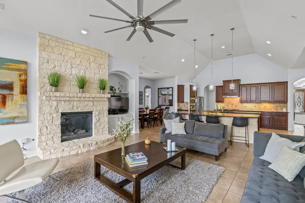 a view of a dining room with furniture and window