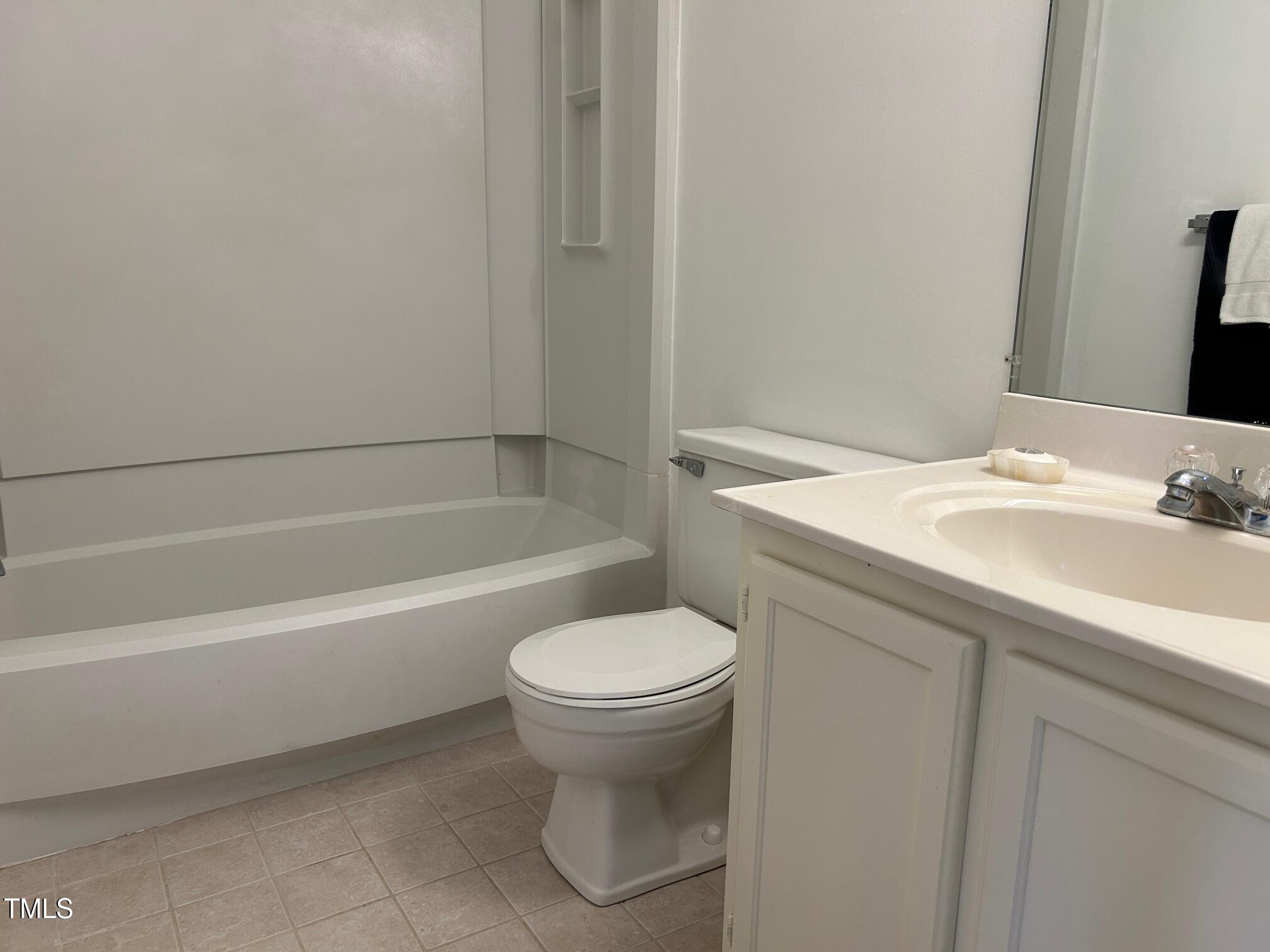 7341 Sweet Bay Lane Raleigh, NC 27615 - Photo 20 of 28 Upstairs bath: ceramic tile floors