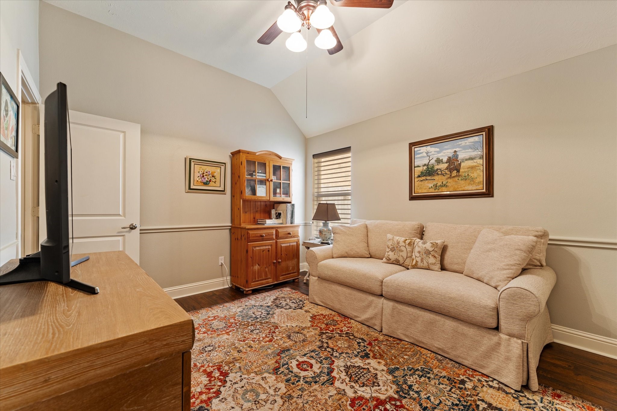 19039 Panther Peak Spring, TX 77388 - Photo 29 of 49 a living room with furniture and a flat screen tv