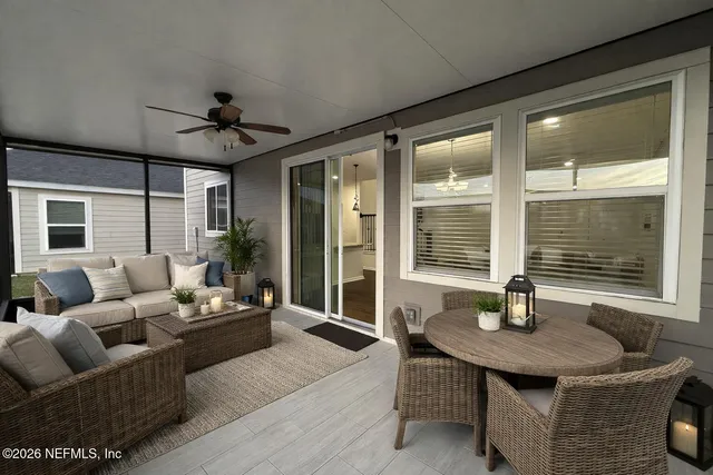 a living room with furniture and a window