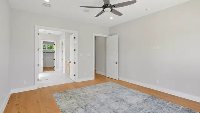 a bedroom with a bed and closet