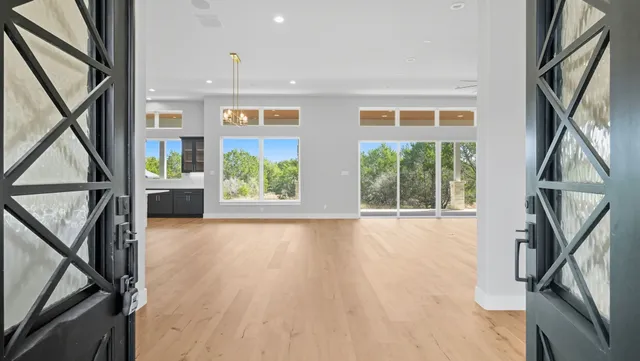 a view of an entryway with wooden floor and stairs